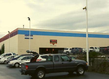 before photo of exterior paint job of commercial/industrial building in Victoria BC